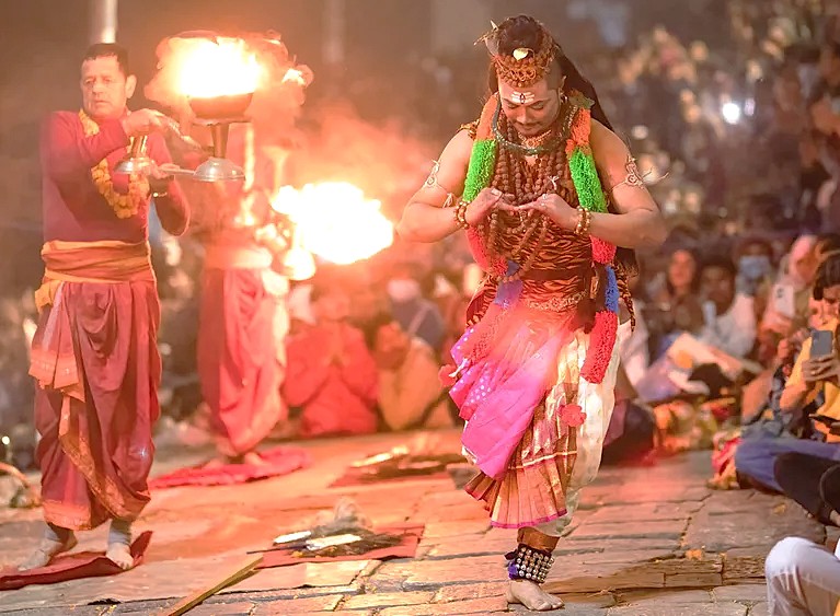 A vibrant devotional dance and ritual dedicated to Lord Shiva during a festival, reflecting the spiritual energy near the Mamleshwara Temple heritage site in Jammu and Kashmir, India. A vibrant devotional dance and ritual dedicated to Lord Shiva during a festival, reflecting the spiritual energy near the Mamleshwara Temple heritage site in Jammu and Kashmir, India.