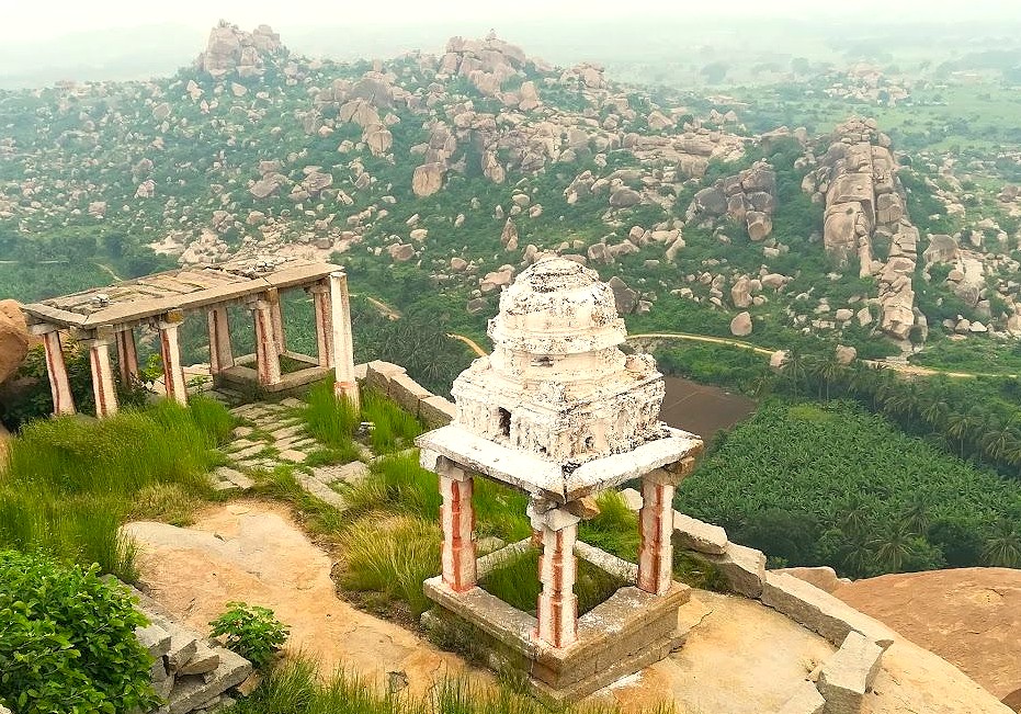 The panoramic view from Matanga Hill overlooks the vast Hampi Unesco site in Karnataka, India, a landscape containing the royal Elephant stables and the ruins of the queens baths.