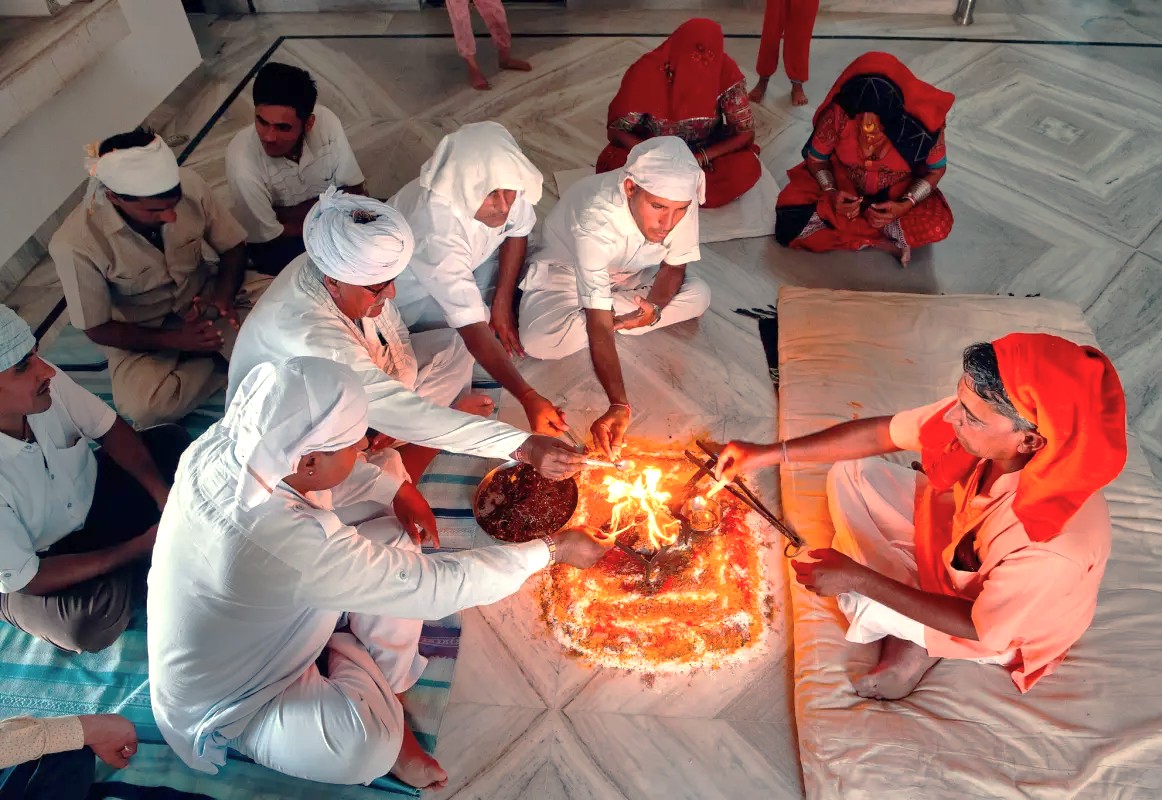 "Experience a sacred fire ceremony in Mathura, India, a spiritual hub located near Agra and the UNESCO Taj Mahal, offering deep cultural immersion for travelers exploring the Golden Triangle." "Experience a sacred fire ceremony in Mathura, India, a spiritual hub located near Agra and the UNESCO Taj Mahal, offering deep cultural immersion for travelers exploring the Golden Triangle."