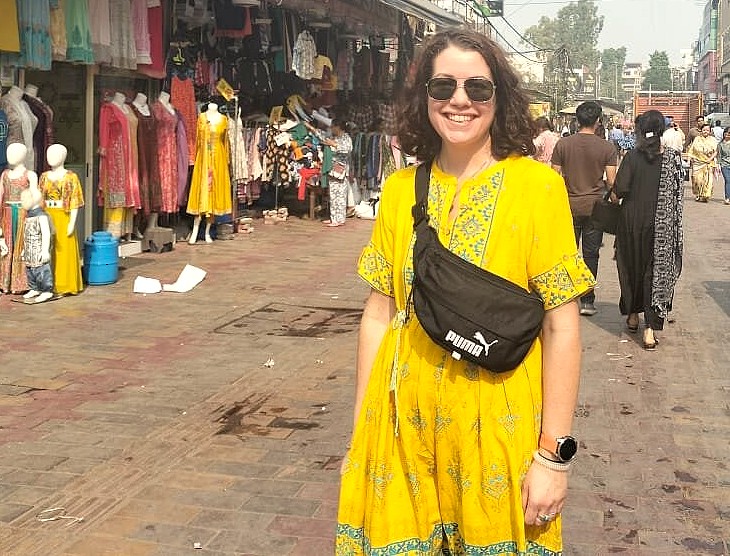 "A happy traveler explores the markets of Mathura, India, located near Agra and the UNESCO Taj Mahal, during a visit to the sacred Krishna Janmabhoomi Temple Mathura India." "A happy traveler explores the markets of Mathura, India, located near Agra and the UNESCO Taj Mahal, during a visit to the sacred Krishna Janmabhoomi Temple Mathura India."