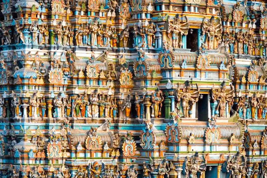 Intricate Chitra Gopuram of Meenakshi Temple in Madurai, Tamil Nadu, epitomizes Dravidian art with vibrant sculptures, rich mythological motifs and architectural splendor, showcasing South India’s cultural heritage and spiritual grandeur. Intricate Chitra Gopuram of Meenakshi Temple in Madurai, Tamil Nadu, epitomizes Dravidian art with vibrant sculptures, rich mythological motifs and architectural splendor, showcasing South India’s cultural heritage and spiritual grandeur.