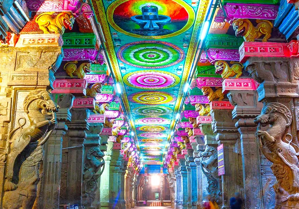 The vibrant hall of carved pillars and painted ceilings inside Meenakshi Temple in Madurai, Tamil Nadu, illustrates the sacred relationship between art and divinity, a must-see for tourists in India also visiting Munnar near the Unesco Western Ghats. The vibrant hall of carved pillars and painted ceilings inside Meenakshi Temple in Madurai, Tamil Nadu, illustrates the sacred relationship between art and divinity, a must-see for tourists in India also visiting Munnar near the Unesco Western Ghats.