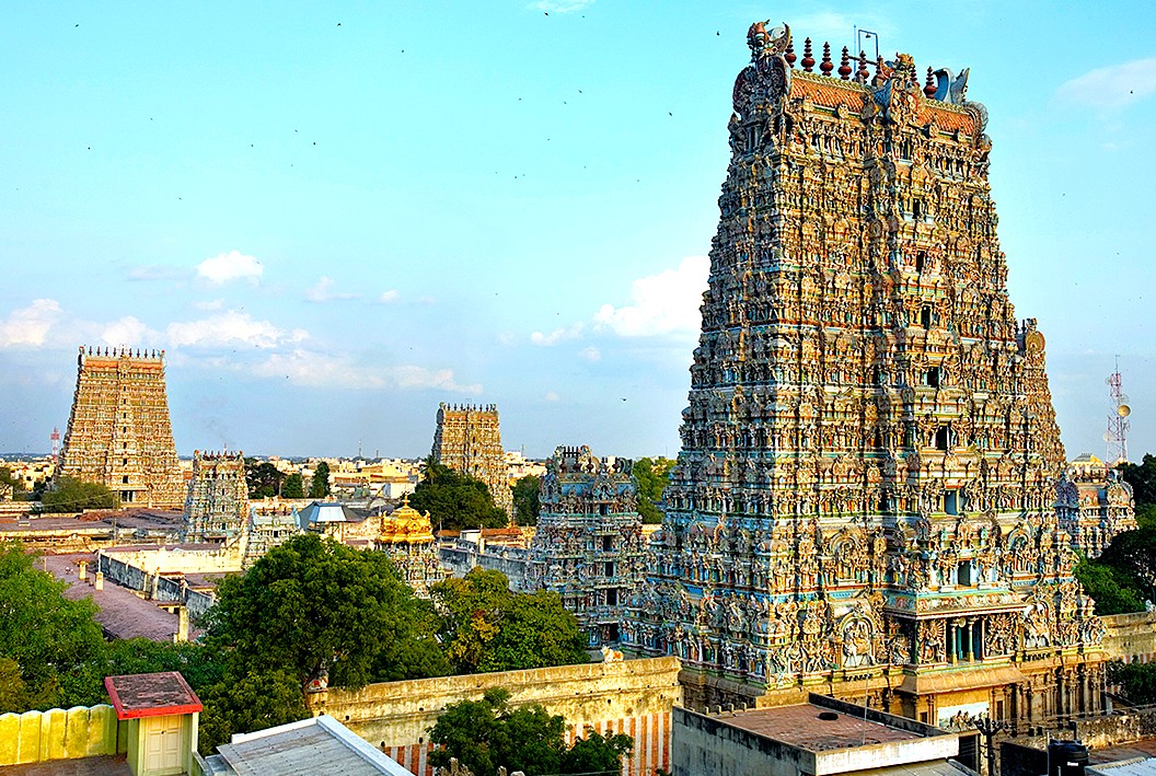 “Vibrant Dravidian Meenakshi Amman Temple in Madurai, India showcases intricately carved gopurams, attracting Kerala pilgrims and Karnataka tourists seeking rich architectural heritage and spiritual experiences.” “Vibrant Dravidian Meenakshi Amman Temple in Madurai, India showcases intricately carved gopurams, attracting Kerala pilgrims and Karnataka tourists seeking rich architectural heritage and spiritual experiences.”