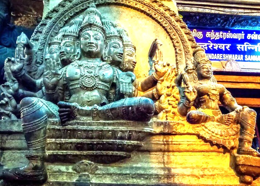 A sculpture of a multi-headed Hindu deity inside Meenakshi Temple in Madurai, Tamil Nadu, explores the complex relationship of divine power, a profound cultural sight for tourists in India also visiting Munnar near the Unesco Western Ghats. A sculpture of a multi-headed Hindu deity inside Meenakshi Temple in Madurai, Tamil Nadu, explores the complex relationship of divine power, a profound cultural sight for tourists in India also visiting Munnar near the Unesco Western Ghats.
