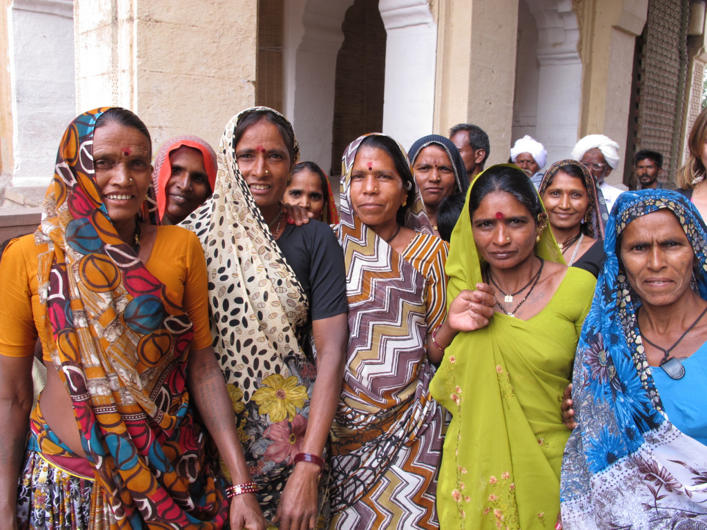 The community relationship of local women at Mehrotra-silks in Varanasi, India, highlights the cultural heritage of artisans working near the historic Sarnath UNESCO site.