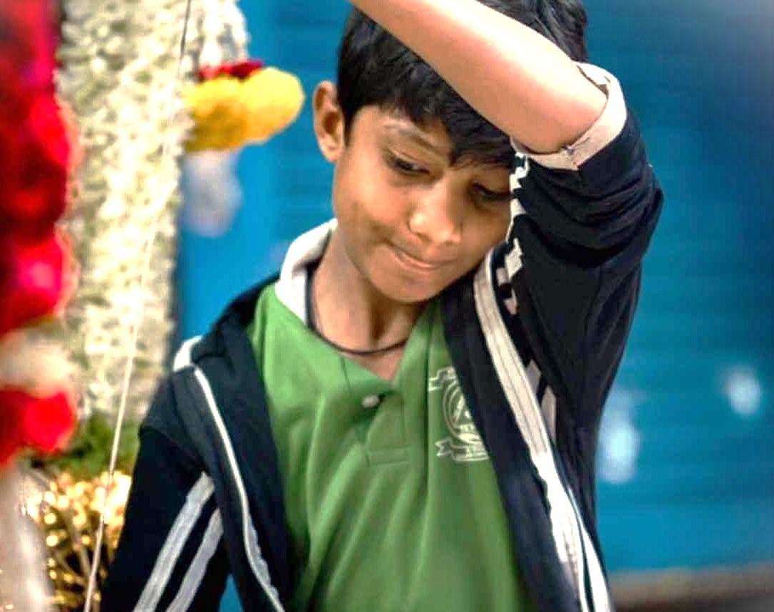 A local boy in Mysore, Karnataka, India, a city famous for the Mysore Palace and near the 'Tiger of Mysore's' Tipu Sultan Palace in Bangalore.