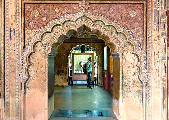 Ornate arches at Tipu Sultan Palace in Bangalore, Karnataka, India, the 'Tiger of Mysore's' home, a key site for tourists visiting attractions near Mysore Palace.