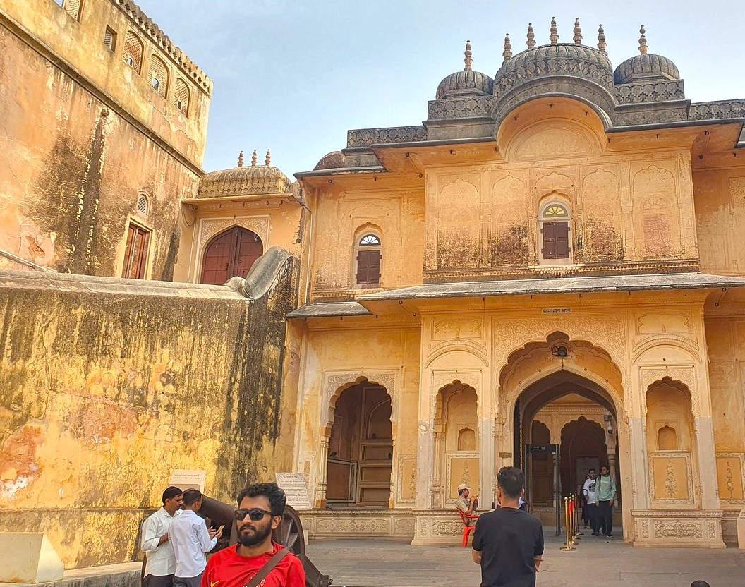 Stunning panoramic vista from Nahargarh Fort in Jaipur, Rajasthan, India showcases majestic ramparts, historic Mughal-inspired architecture, vibrant sunset hues and panoramic city views, inviting heritage exploration and cultural photography experiences.