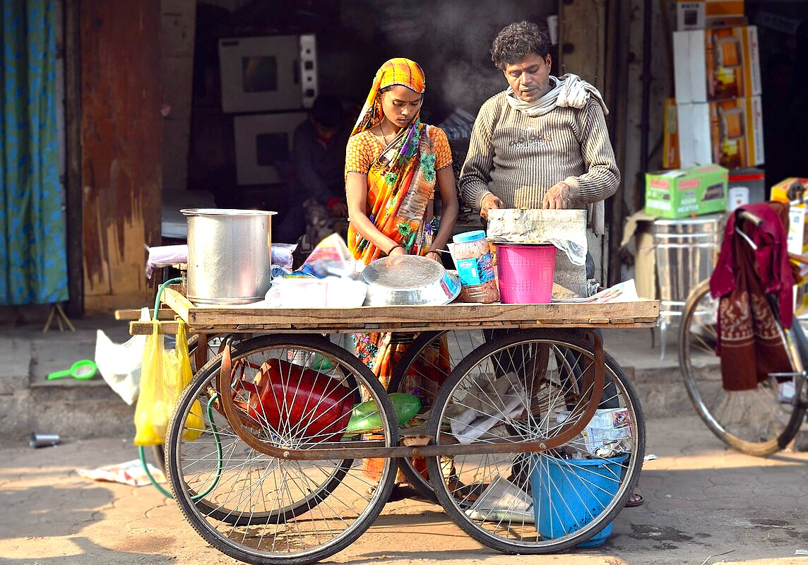 Local food vendors prepare authentic Indian cuisine near the monolithic Nandi Bull Lepakshi and the Chalukyan UNESCO heritage site of Pattadakal, promoting cultural food tours. Local food vendors prepare authentic Indian cuisine near the monolithic Nandi Bull Lepakshi and the Chalukyan UNESCO heritage site of Pattadakal, promoting cultural food tours.