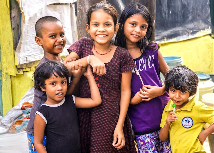 Smiling children embody the vibrant local culture found in India near the magnificent Nandi Bull Lepakshi and the ancient UNESCO heritage site of Pattadakal, promoting community travel. Smiling children embody the vibrant local culture found in India near the magnificent Nandi Bull Lepakshi and the ancient UNESCO heritage site of Pattadakal, promoting community travel.