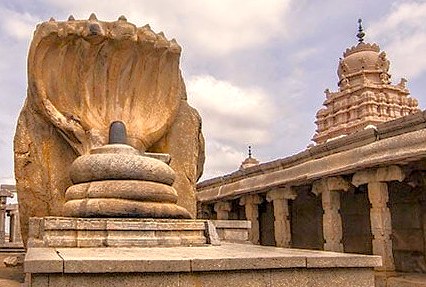 Inside Lepakshi, this massive Nagalinga sits near the Nandi Bull and Veerabhadra Temple, representing South Indian devotion found near the UNESCO site of Pattadakal, India. Inside Lepakshi, this massive Nagalinga sits near the Nandi Bull and Veerabhadra Temple, representing South Indian devotion found near the UNESCO site of Pattadakal, India.
