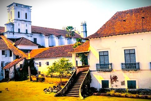 Warm sunlight on historic buildings at the Old Goa-Unesco churches, a site in Goa, India, near the Church of Saint Augustine Old Goa, popular for tourists visiting beaches. Warm sunlight on historic buildings at the Old Goa-Unesco churches, a site in Goa, India, near the Church of Saint Augustine Old Goa, popular for tourists visiting beaches.