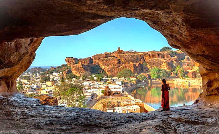 A stunning view from the Badami cave temples in Karnataka, India, overlooking the town, located near the Ravana Pralad Cave Temple in Aihole and the Pattadarle UNESCO site. A stunning view from the Badami cave temples in Karnataka, India, overlooking the town, located near the Ravana Pralad Cave Temple in Aihole and the Pattadarle UNESCO site.