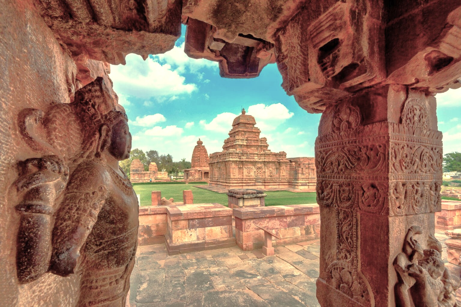 A view of the Pattadakal UNESCO site temple complex in Karnataka, India, located near the Ravana Pralad Cave Temple in Aihole and the Badami cave temples. A view of the Pattadakal UNESCO site temple complex in Karnataka, India, located near the Ravana Pralad Cave Temple in Aihole and the Badami cave temples.