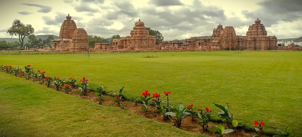 A panoramic view of the Pattadakal Temple Complex, a UNESCO site in Karnataka, India, located near Badami and the Ravana Pralad Cave Temple in Aihole. A panoramic view of the Pattadakal Temple Complex, a UNESCO site in Karnataka, India, located near Badami and the Ravana Pralad Cave Temple in Aihole.