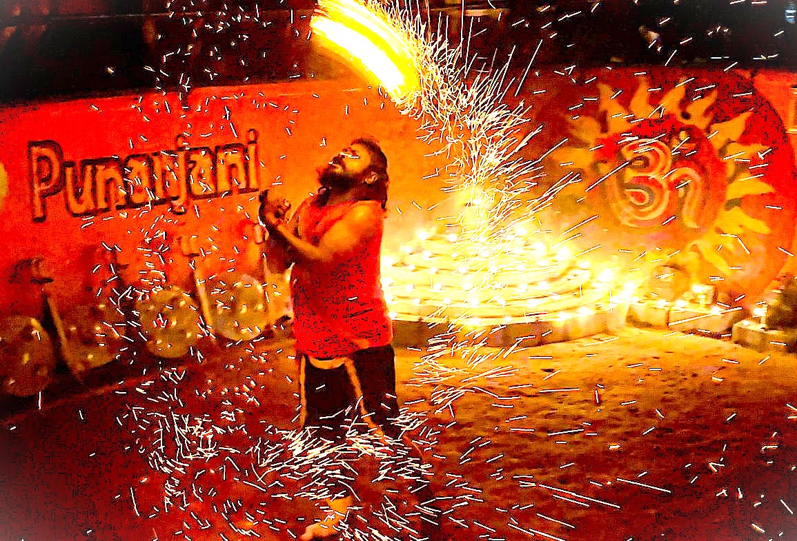 Witness the intense relationship between performer and ancient tradition in this fiery display at Punarjani Cultural Village in Munnar. This captivating experience is a highlight on a South India tour near Madurai and Kochi, through the UNESCO Western Ghats, India. Witness the intense relationship between performer and ancient tradition in this fiery display at Punarjani Cultural Village in Munnar. This captivating experience is a highlight on a South India tour near Madurai and Kochi, through the UNESCO Western Ghats, India.