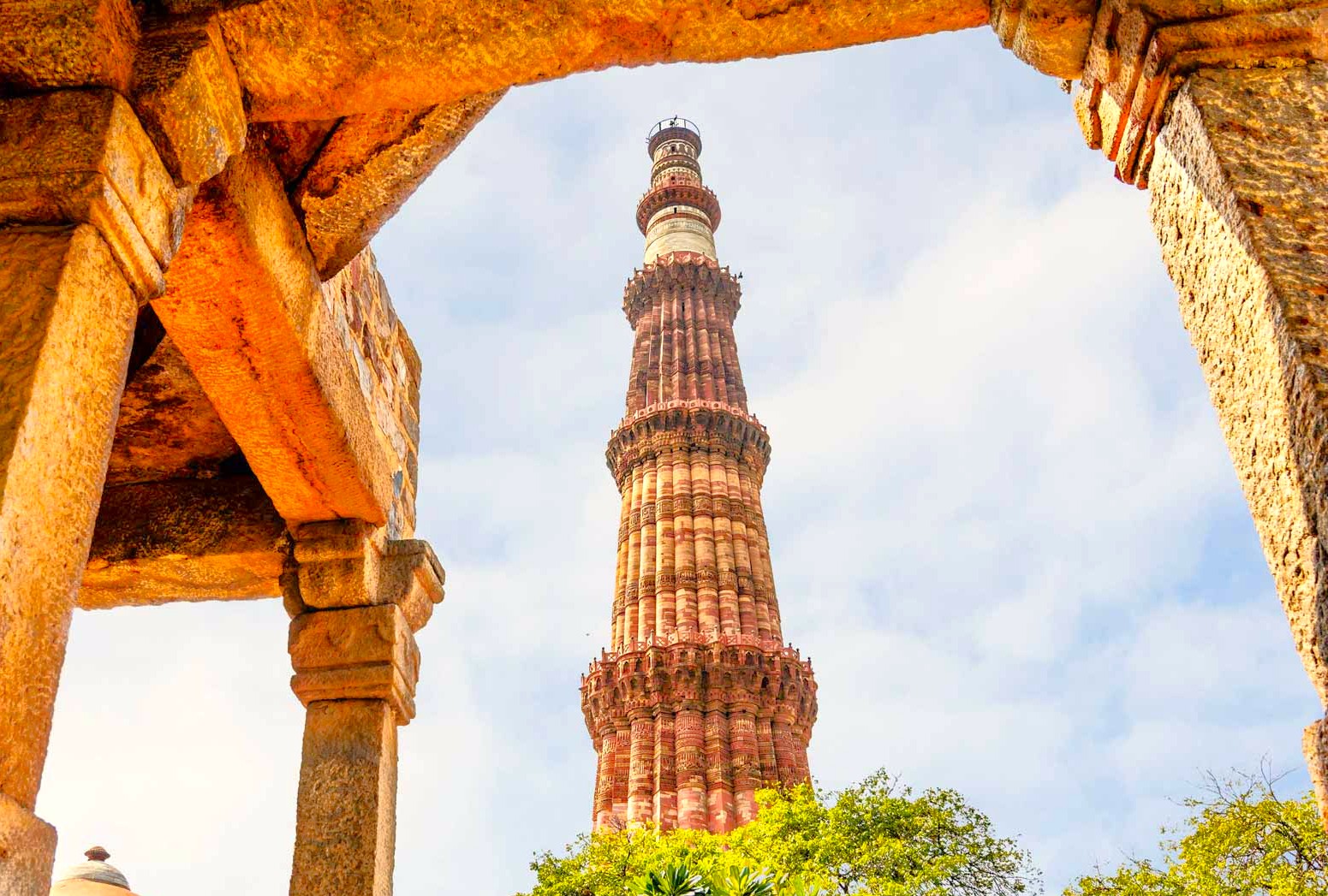 The historic Qutb Minar in Delhi, India, is framed by ancient stone ruins at this renowned UNESCO World Heritage site, located near the UNESCO Red Fort and UNESCO Humayun's Tomb. The historic Qutb Minar in Delhi, India, is framed by ancient stone ruins at this renowned UNESCO World Heritage site, located near the UNESCO Red Fort and UNESCO Humayun's Tomb.