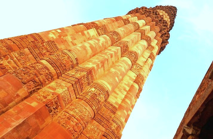 Qutb Minar in Delhi, India, stands as a majestic red sandstone UNESCO World Heritage tower, showcasing intricate Islamic carvings, Mughal architectural splendor, attracting history enthusiasts, architecture lovers, and sightseeing tours. Qutb Minar in Delhi, India, stands as a majestic red sandstone UNESCO World Heritage tower, showcasing intricate Islamic carvings, Mughal architectural splendor, attracting history enthusiasts, architecture lovers, and sightseeing tours.