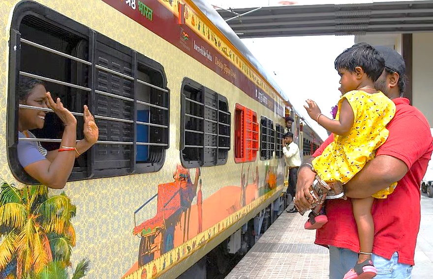 “Thrilling farewell aboard an India Rajasthan train departing Delhi, bound for Bikaner, showcasing vibrant murals and expressions on a memorable Railway Journey from Delhi to Bikaner into the Thar Desert.”