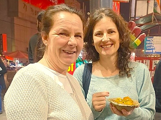 Tourists enjoy a snack on a platform during a railway Joreney from Srinagar to Banil, Kashmir Tourists enjoy a snack on a platform during a railway Joreney from Srinagar to Banil, Kashmir