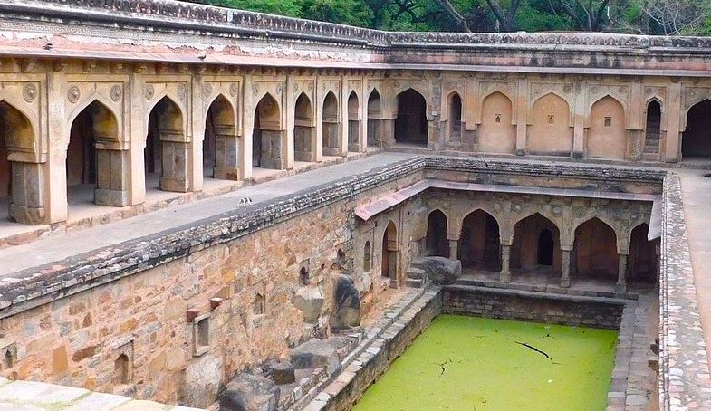 Rajaon-ki-baoli in Delhi, India, is a centuries-old ASI-protected stepwell showcasing intricate stone arches and columns, historic water reservoir architecture, cultural heritage site attracting history enthusiasts, archaeology tours, and photography opportunities. Rajaon-ki-baoli in Delhi, India, is a centuries-old ASI-protected stepwell showcasing intricate stone arches and columns, historic water reservoir architecture, cultural heritage site attracting history enthusiasts, archaeology tours, and photography opportunities.
