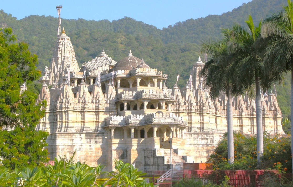 Intricate marble carvings of the Ranakpur Jain Temple nestled in the Aravali Hills near Jodhpur, Rajasthan, India, exemplify serene spiritual architectural heritage surrounded by lush hills and sacred pilgrimage landscape. Intricate marble carvings of the Ranakpur Jain Temple nestled in the Aravali Hills near Jodhpur, Rajasthan, India, exemplify serene spiritual architectural heritage surrounded by lush hills and sacred pilgrimage landscape.