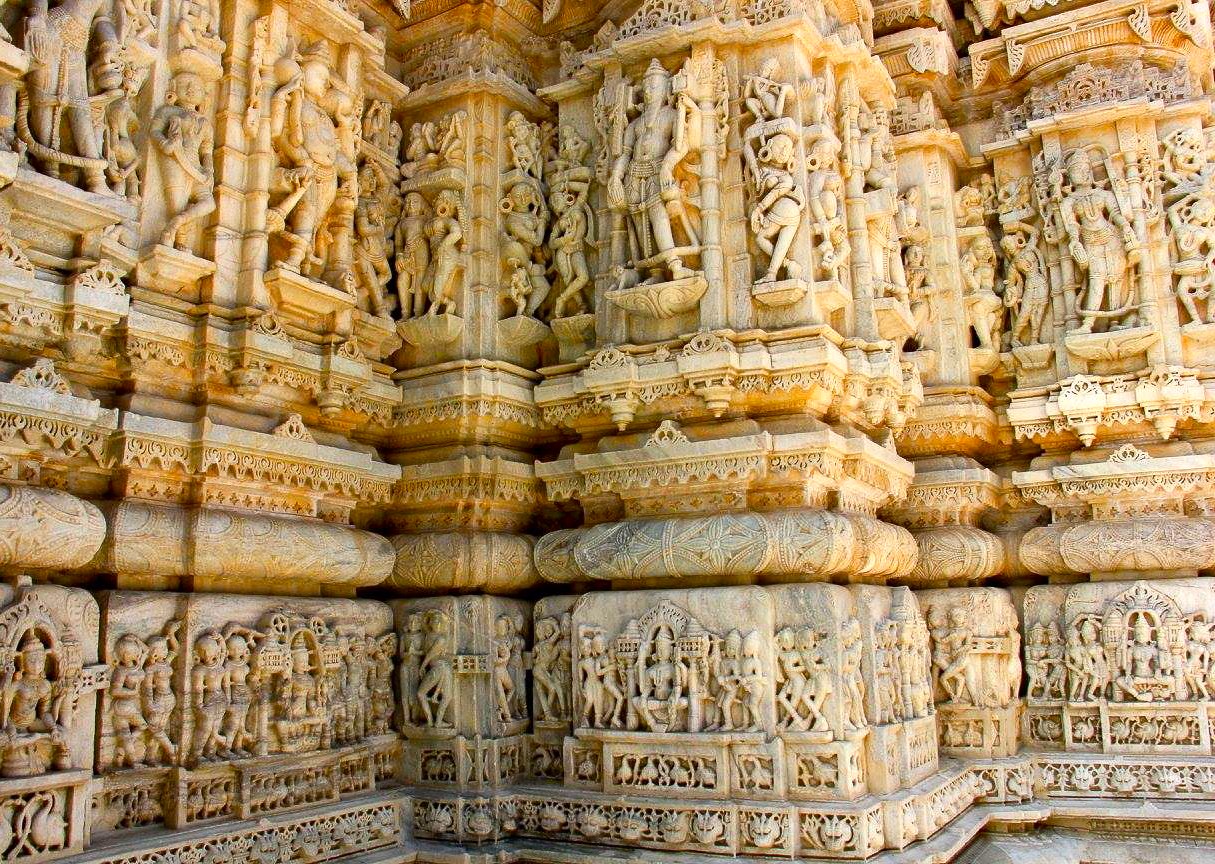 Intricate marble carvings in Ranakpur Jain Temple nestled in the Aravali Hills near Jodhpur, Rajasthan, India showcase centuries-old craftsmanship, Jain mythology and spiritual artistry blending architecture with serene mountain backdrop. Intricate marble carvings in Ranakpur Jain Temple nestled in the Aravali Hills near Jodhpur, Rajasthan, India showcase centuries-old craftsmanship, Jain mythology and spiritual artistry blending architecture with serene mountain backdrop.