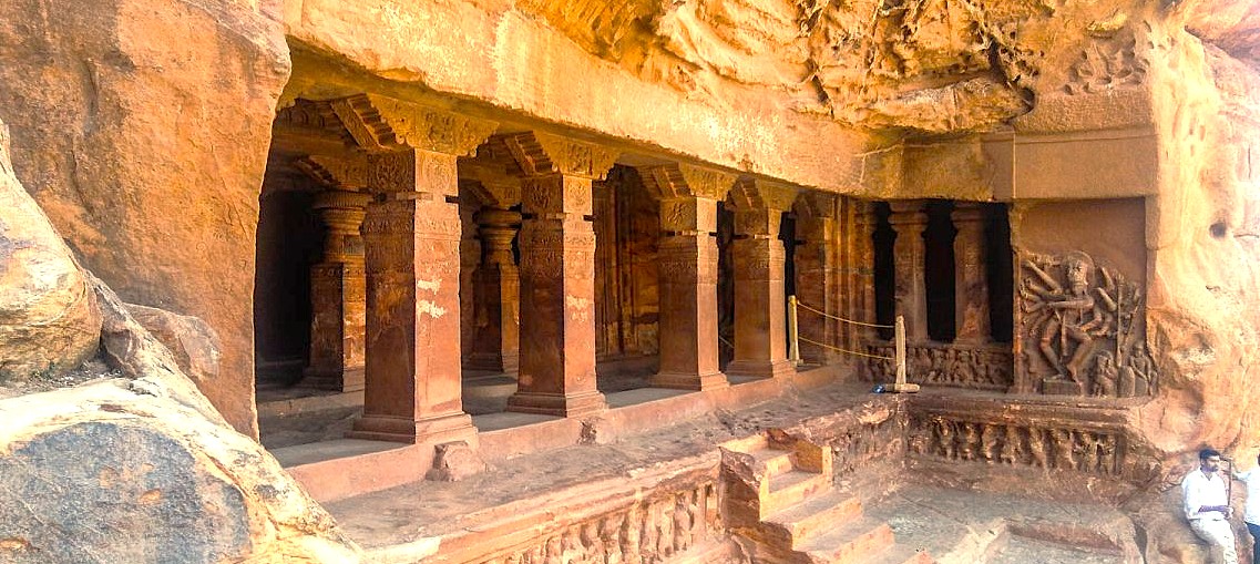 The interior pillared hall of the Ravana Phadi Cave Temple (Ravanapralad) in Aihole, Karnataka, India, a historic site near Badami and the Pattadakal UNESCO site. The interior pillared hall of the Ravana Phadi Cave Temple (Ravanapralad) in Aihole, Karnataka, India, a historic site near Badami and the Pattadakal UNESCO site.