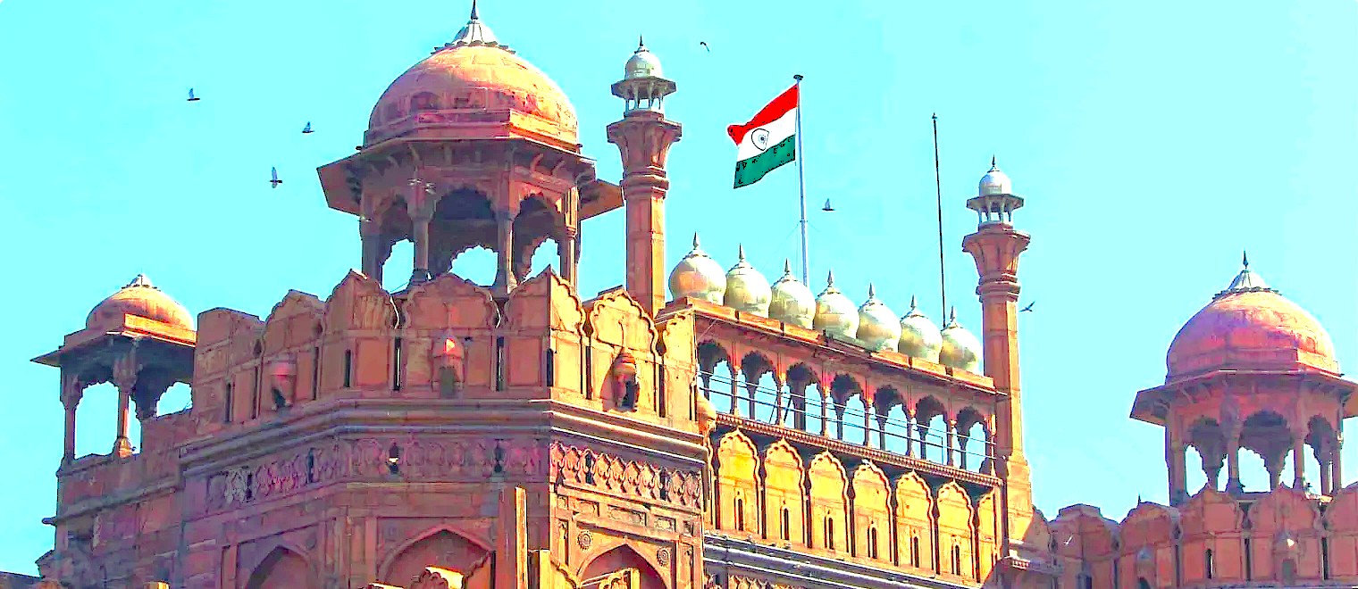 The Indian flag flies over the Red Fort in Delhi-NCT, India, a UNESCO World Heritage Site associated with Humayun's Tomb and Qutb Minar. The Indian flag flies over the Red Fort in Delhi-NCT, India, a UNESCO World Heritage Site associated with Humayun's Tomb and Qutb Minar.