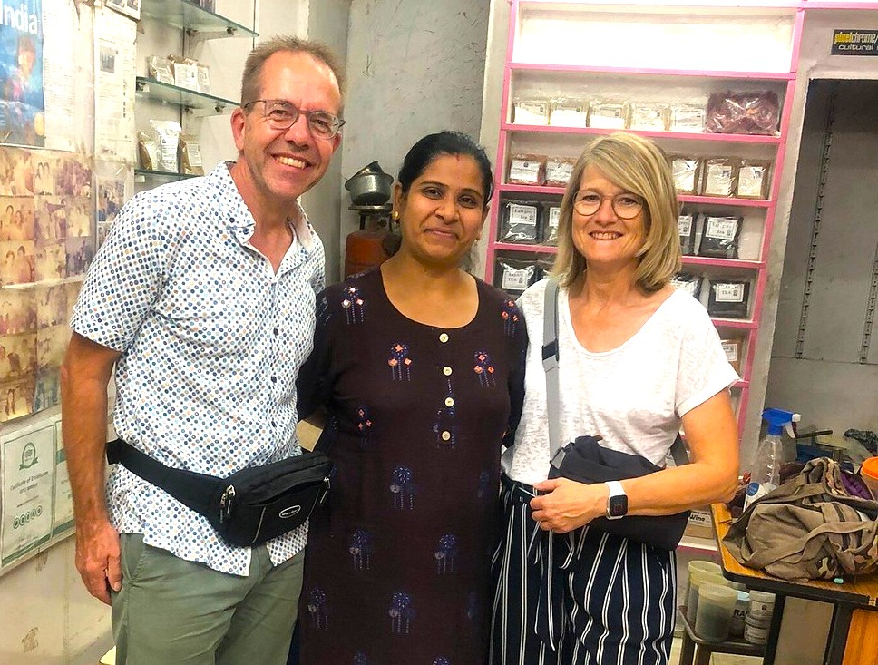 Road trip from Coimbatore to Kodaikanal, Tamil Nadu, India, shows travelers meeting a local artisan in a workshop surrounded by traditional spices, crafts and tools. Road trip from Coimbatore to Kodaikanal, Tamil Nadu, India, shows travelers meeting a local artisan in a workshop surrounded by traditional spices, crafts and tools.