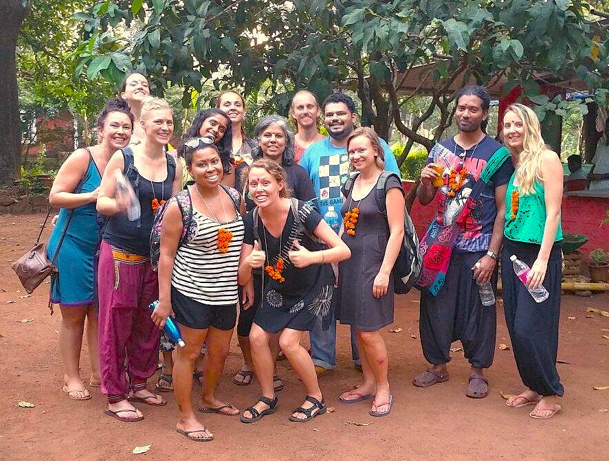 A diverse group of tourists explores Old Goa, India, visiting the historic Royal Chapel of Saint Anthony, located near the UNESCO World Heritage Bom Jesus Basilica. A diverse group of tourists explores Old Goa, India, visiting the historic Royal Chapel of Saint Anthony, located near the UNESCO World Heritage Bom Jesus Basilica.