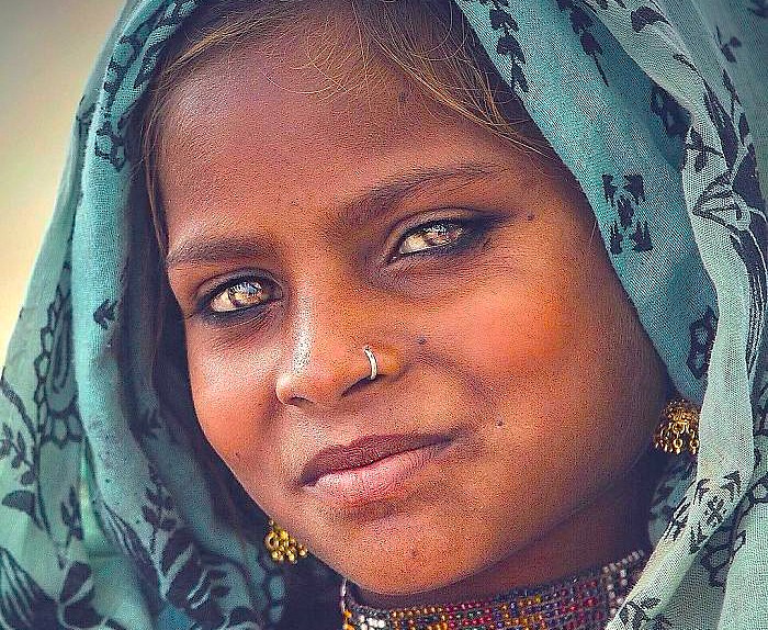 A portrait of a young local woman in traditional attire at the Sahyadri Spice Farm in Goa, India, near Karnataka and the Old Goa St. Francis Church UNESCO churches. A portrait of a young local woman in traditional attire at the Sahyadri Spice Farm in Goa, India, near Karnataka and the Old Goa St. Francis Church UNESCO churches.