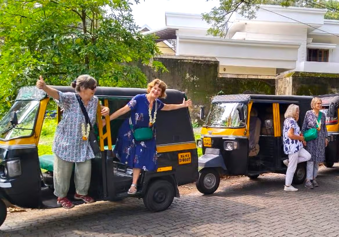 Women pose exuberantly on auto rickshaws outside Saint Mary’s Basilica Kochi, exploring vibrant Kerala streets in South India, capturing joyful camaraderie, cultural immersion, picturesque greenery and colonial architecture. Women pose exuberantly on auto rickshaws outside Saint Mary’s Basilica Kochi, exploring vibrant Kerala streets in South India, capturing joyful camaraderie, cultural immersion, picturesque greenery and colonial architecture.