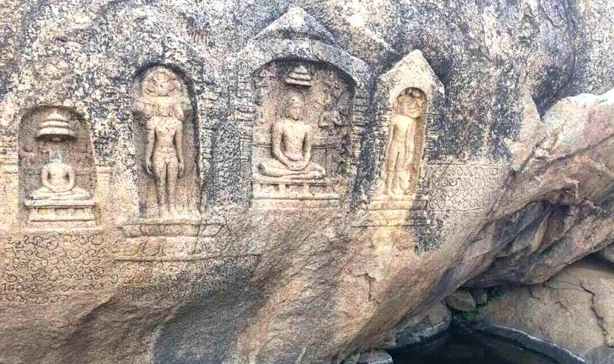 Mystical ancient rock carvings etched into the granite face of Samarnar Hills in Madurai, Tamil Nadu, South India, reveal intricate Buddhist-era iconography attracting scholarly archaeology enthusiasts and cultural heritage tours. Mystical ancient rock carvings etched into the granite face of Samarnar Hills in Madurai, Tamil Nadu, South India, reveal intricate Buddhist-era iconography attracting scholarly archaeology enthusiasts and cultural heritage tours.