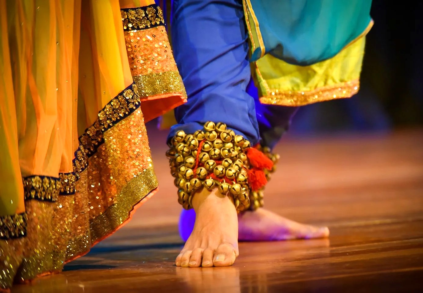Ghungroos and vibrant silk adorn a classical dancer’s feet, capturing the energy of the Pattadakal Dance Festival celebrating India’s unique culture at the ancient UNESCO heritage site. Ghungroos and vibrant silk adorn a classical dancer’s feet, capturing the energy of the Pattadakal Dance Festival celebrating India’s unique culture at the ancient UNESCO heritage site.