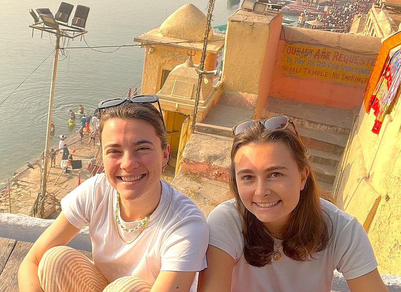 The warm relationship between two friends is captured as they explore the ghats of Varanasi, India, a spiritual city near the ancient Sarnath UNESCO World Heritage site.