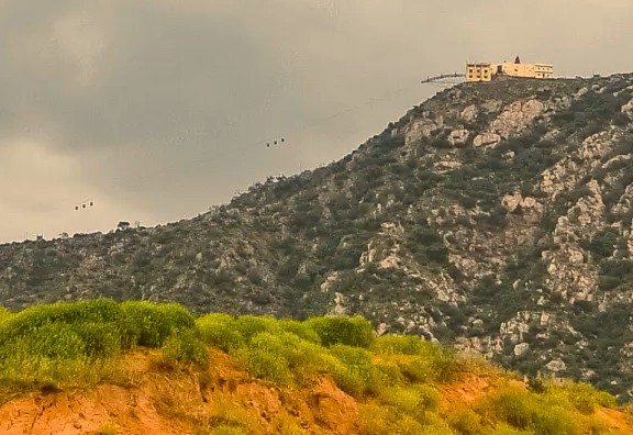 Historic hilltop Savitri Mata Temple, overlooking Pushkar and Ajmer in Rajasthan, India, lies between Jaipur and Agra en route to the iconic Taj Mahal, offering panoramic mountain and valley views.
