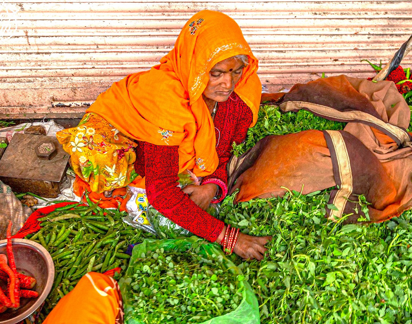 "Colorful Indian street vendor sells fresh vegetables at Shahganj Dargah market in Aurangabad, Maharashtra, offering vibrant produce near UNESCO Ellora and Ajanta Caves, showcasing traditional flavors and authentic local culture."