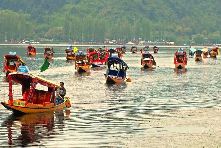 "Explore the scenic diversity of Kashmir, from the historic Dal Gate and Floating Markets in Srinagar to a tranquil Dal Lake shikara boat ride, connecting visitors to the soaring Gulmarg Gondola and lush Beetab and Aru Valleys." "Explore the scenic diversity of Kashmir, from the historic Dal Gate and Floating Markets in Srinagar to a tranquil Dal Lake shikara boat ride, connecting visitors to the soaring Gulmarg Gondola and lush Beetab and Aru Valleys."