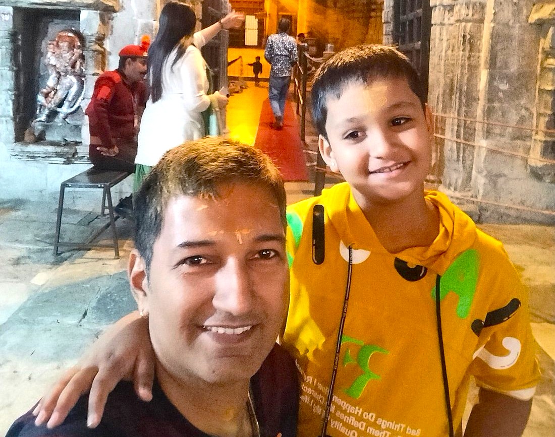 Father and son smiling selfie inside historic Jag Mandir palace on Lake Pichola, Udaipur, Rajasthan, India, exploring vibrant ornate marble architecture, reflecting centuries-old Rajput royal heritage and cultural timeless splendor. Father and son smiling selfie inside historic Jag Mandir palace on Lake Pichola, Udaipur, Rajasthan, India, exploring vibrant ornate marble architecture, reflecting centuries-old Rajput royal heritage and cultural timeless splendor.