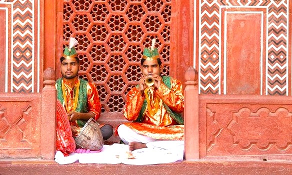 Intricate floral marble cenotaphs adorned with precious stone inlays showcase masterful Mughal craftsmanship inside Agra's majestic Taj Mahal in Uttar Pradesh, India. Intricate floral marble cenotaphs adorned with precious stone inlays showcase masterful Mughal craftsmanship inside Agra's majestic Taj Mahal in Uttar Pradesh, India.
