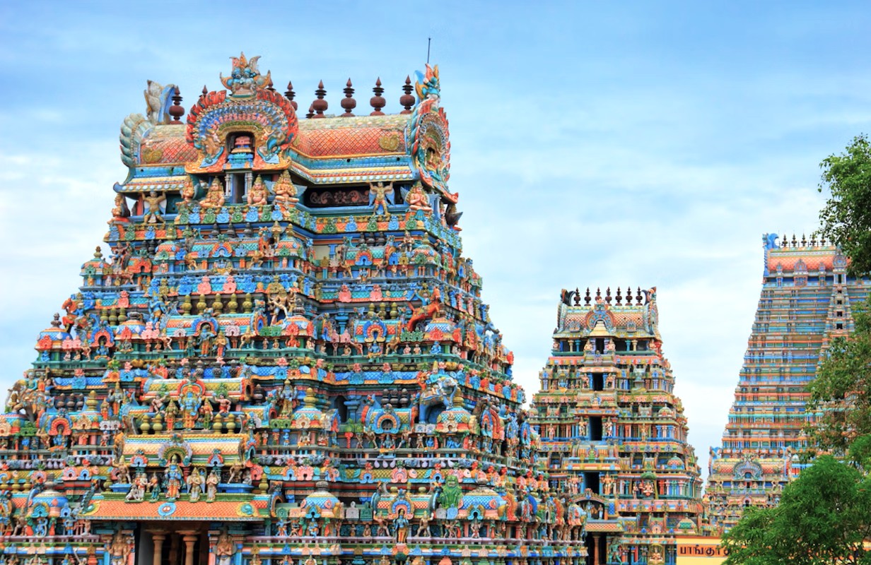 Vibrant Dravidian temple gopurams in Tamil Nadu, southern India highlight intricate carvings and colorful sculptures, showcasing centuries-old craftsmanship and rich spiritual heritage of southern India. Vibrant Dravidian temple gopurams in Tamil Nadu, southern India highlight intricate carvings and colorful sculptures, showcasing centuries-old craftsmanship and rich spiritual heritage of southern India.