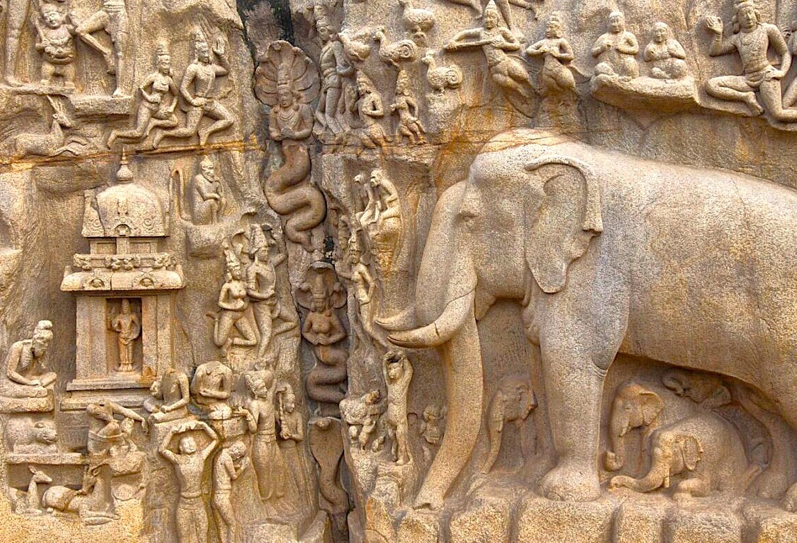 Intricate ancient stone relief in Tamil Nadu, southern India, depicts majestic elephant, revered serpent, human figures and shrine motif, reflecting rich southern India religious artistry. Intricate ancient stone relief in Tamil Nadu, southern India, depicts majestic elephant, revered serpent, human figures and shrine motif, reflecting rich southern India religious artistry.