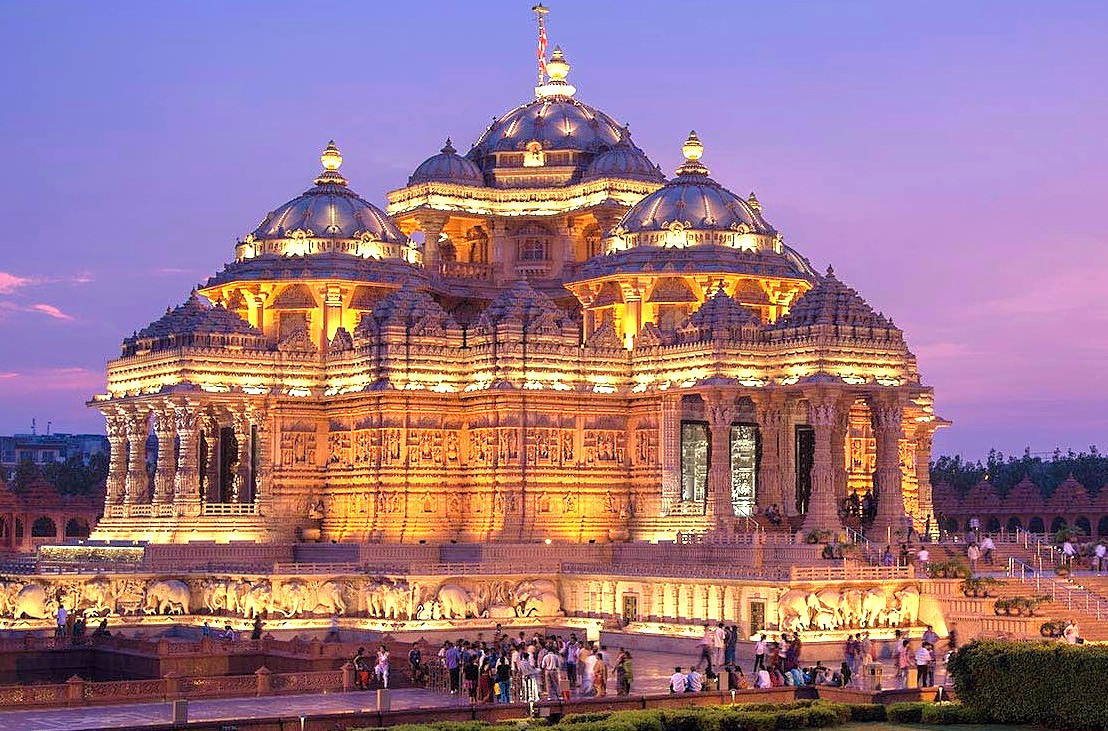 Marvel at the illuminated Swaminarayan Akshardham Temple in Delhi, India, a spiritual landmark situated near the bustling Gandhi Chowk and historic UNESCO sites including the Red Fort, Qutub Minar, and Humayun's Tomb. Marvel at the illuminated Swaminarayan Akshardham Temple in Delhi, India, a spiritual landmark situated near the bustling Gandhi Chowk and historic UNESCO sites including the Red Fort, Qutub Minar, and Humayun's Tomb.