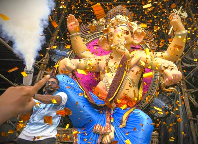 A vibrant Ganesha festival in India, capturing the cultural energy of a Bangalore tour that often includes visits to Mysore Palace and the nearby Tipu Sultan Palace.