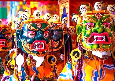 Vibrant and colorful traditional Tibetan festival masks on display at the famous Tibetan Market in Delhi, India, a cultural hub near UNESCO sites like the Qutb Minar, UNESCO Red Fort, and UNESCO Humayun's Tomb. Vibrant and colorful traditional Tibetan festival masks on display at the famous Tibetan Market in Delhi, India, a cultural hub near UNESCO sites like the Qutb Minar, UNESCO Red Fort, and UNESCO Humayun's Tomb.