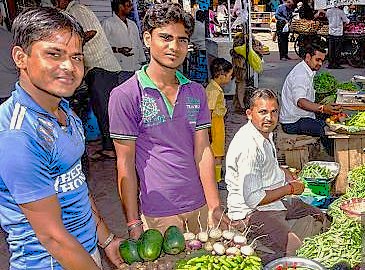 Local vendors sell fresh vegetables at the bustling Town Hall Markets in Coimbatore, a major city in Tamil Nadu, India. This vibrant market offers a slice of daily life for residents and a cultural experience for tourists visiting nearby hill stations like Kodaikanal and Ooty. Local vendors sell fresh vegetables at the bustling Town Hall Markets in Coimbatore, a major city in Tamil Nadu, India. This vibrant market offers a slice of daily life for residents and a cultural experience for tourists visiting nearby hill stations like Kodaikanal and Ooty.
