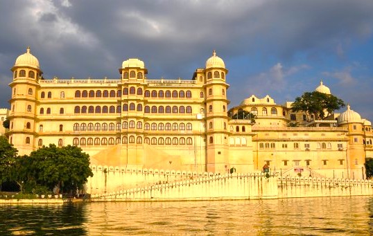 Majestic City Palace stands on the shores of Lake Pichola in Udaipur, Rajasthan, India, reflecting vibrant heritage architecture, intricate domes, serene waterfront vistas, rich cultural legacy, stunning panoramic lake views. Majestic City Palace stands on the shores of Lake Pichola in Udaipur, Rajasthan, India, reflecting vibrant heritage architecture, intricate domes, serene waterfront vistas, rich cultural legacy, stunning panoramic lake views.