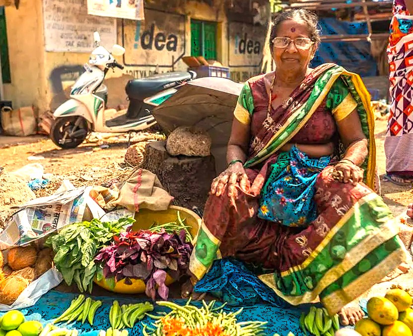 A local vendor embodies the vibrant daily life near the famous Veerabhadra Temple in Lepakshi, Andhra Pradesh, India, a historic site renowned for the Lepakshi floating pillar. A local vendor embodies the vibrant daily life near the famous Veerabhadra Temple in Lepakshi, Andhra Pradesh, India, a historic site renowned for the Lepakshi floating pillar.