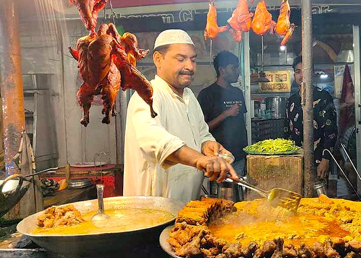 A vendor prepares flavorful street food and local cuisine near Anantnag, reflecting the dynamic culture and daily life around Vishveshwara Temple and the UNESCO City of Arts, Srinagar, in Kashmir-India. A vendor prepares flavorful street food and local cuisine near Anantnag, reflecting the dynamic culture and daily life around Vishveshwara Temple and the UNESCO City of Arts, Srinagar, in Kashmir-India.